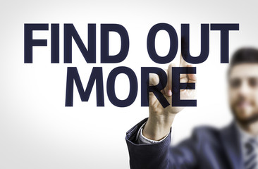 Business man pointing the text: Find Out More