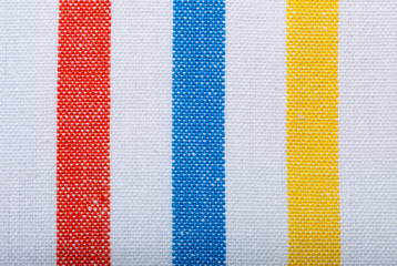 Closeup of colorful striped textile as background or texture