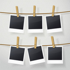 blank photo frames on rope