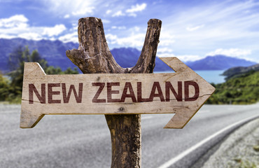 New Zealand wooden sign with landscape background