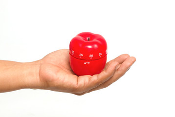 Chef 's hand with a apple timer