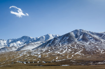 Beautiful snowy Tibetan high mountain landscape with the lonely