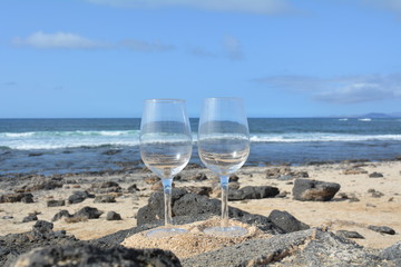 Two Glasses Of  Wine On The Tropical Beach