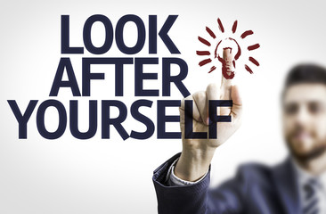 Business man pointing the text: Look After Yourself