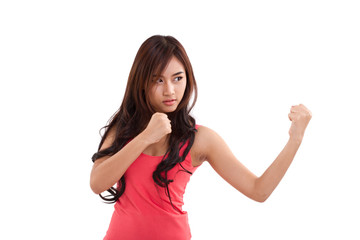 portrait of female fighter, boxer punching pose