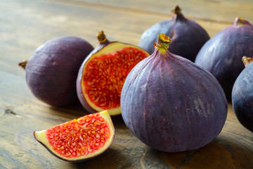 Fresh figs on wooden background