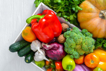 Fresh vegetables on wooden table