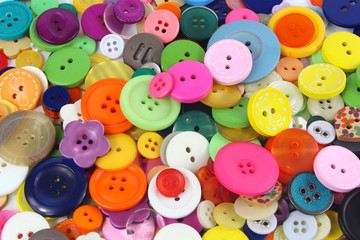 Fototapeta na wymiar Many coloured sewing buttons