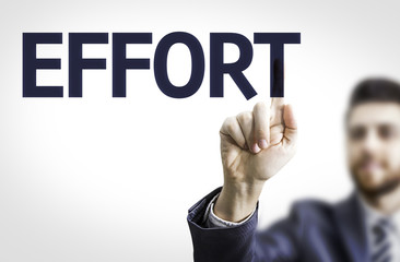 Business man pointing to transparent board with text: Effort