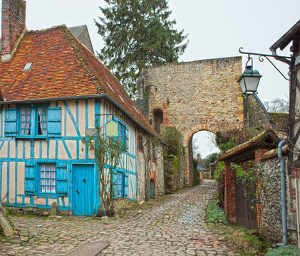Old street in medieval village. Gerberoy, northern France.