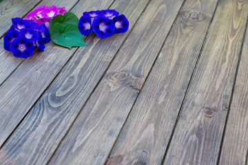 wooden background with flowers