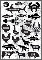 Naklejka premium set vector silhouettes of animals and birds on wood background