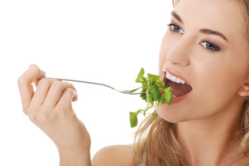 Smiling woman eating salat
