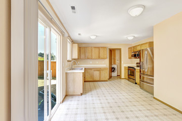 Contryside house interior. Kitchen room with exit to backyard ar