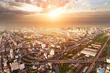 Fototapeta premium bird view of urban cityscape at sunset