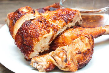 Grilled chicken on plate.