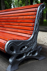 Beautiful bench, standing in a city park.
