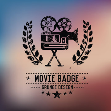 Movie badge grunge symbol on blur background