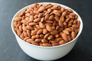 almond nuts in white bowl