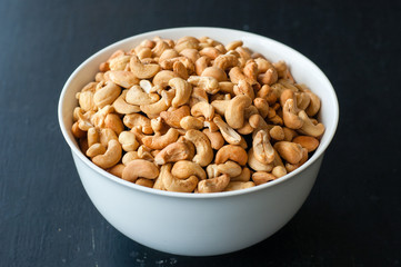 cashew nuts in white bowl