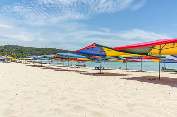 Tropical beach with shade umbrella