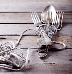 Vintage cutlery, spoon and forks roped
