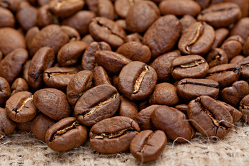 Roasted coffee beans on the sacking