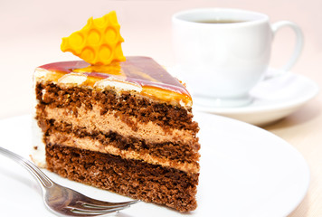 Piece of honey cake on plate