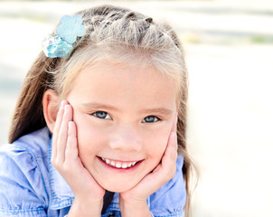 Portrait of adorable smiling little girl