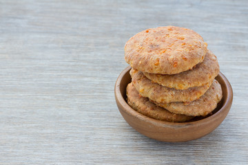 Cheese flat bread in a wooden bowl