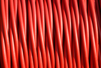 background of red electric cable insulating rubber