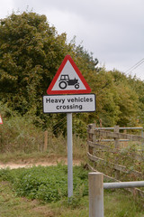 Heavy Vehicles crossing sign and signpost