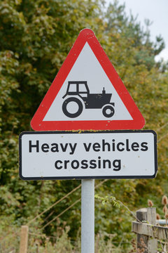 Heavy Vehicles crossing sign and signpost