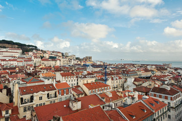 Naklejka na ściany i meble Beautiful view of old city from Santa Justa terrace with cloudy