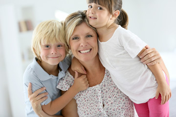 Portrait of happy mother with kids