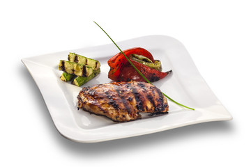 grilled chicken steak and roasted vegetables