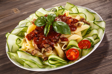 Pasta with meat, tomato sauce and vegetables