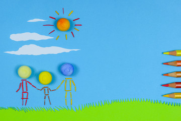 Fototapeta na wymiar Figurative family holding hands on a sunny day against blue sky