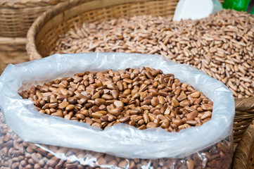 Open-air market sells pine nuts