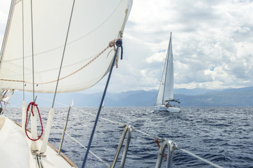 Obraz premium Sailing regatta. Luxury yacht at ocean race.