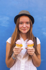 Young cute hipster girl with ice cream in hand.