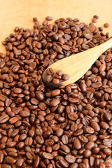 coffee beans and wooden spoon