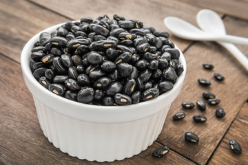 Fototapeta na wymiar Black beans in white bowl