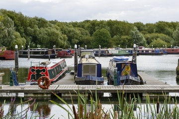 Fototapeta na wymiar narrow boats at quay in Thames and Kennet Marina, Reading