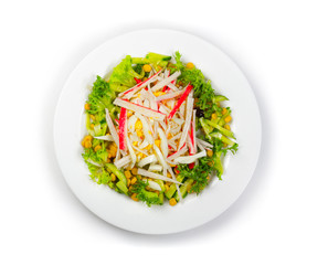 Fresh salad with crabmeat and vegetables isolated