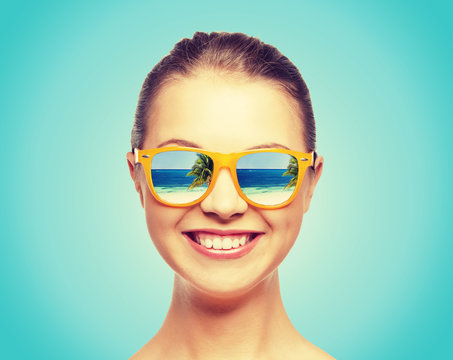 happy teenage girl in sunglasses