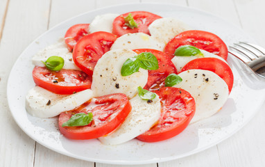 Italian Caprese salad with tomato and mozzarella