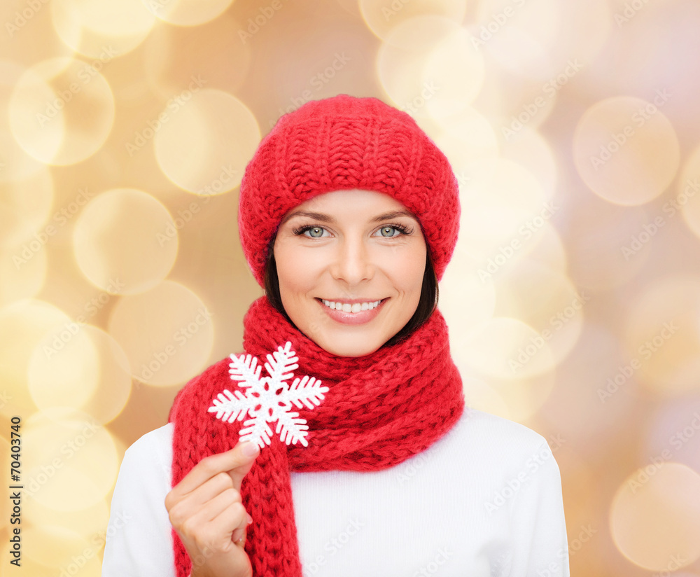 Wall mural smiling young woman in winter clothes