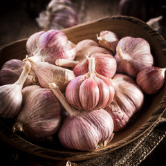 garlic bulb on rustic wooden background