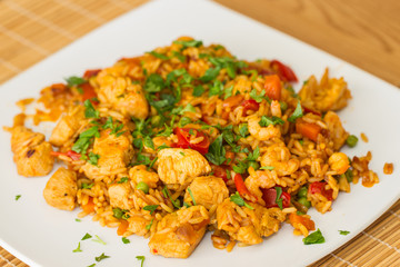 Paella serving on a plate.